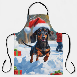 Dachshund Running in Snow with Christmas Hat Apron