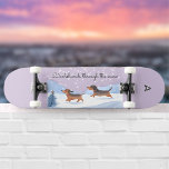 Dachshunds Through The Snow Monogrammed Christmas Skateboard<br><div class="desc">This fun skateboard features two lively dachshunds running happily through the winter snow. The caption above them is a festive pun, 'Dachshunds through the snow'. The cute picture is in a watercolor style, with the rest of the board a pastel lilac color. Personalize the board with a monogram initial, which...</div>