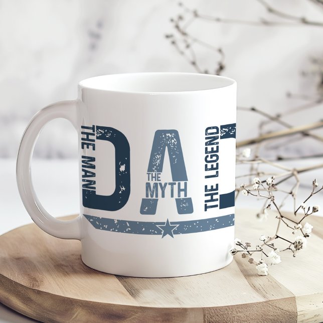 "DAD The Man Mith Legend" Father's Day Gift Coffee Mug ("DAD The Man Mith Legend" Father's Day Gift Coffee Mug on a boho table with tiny dry flowers)