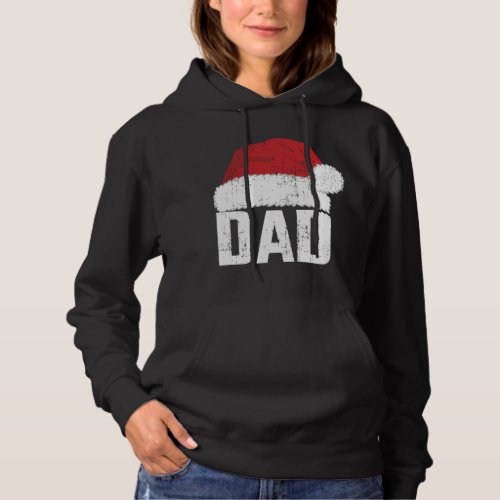 Dad with santa claus hat matching family christmas hoodie
