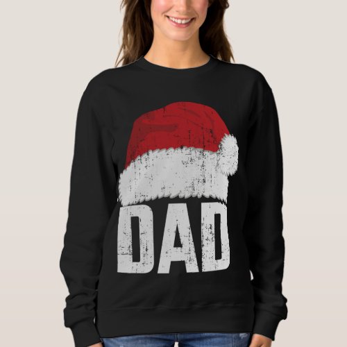 Dad with santa claus hat matching family christmas sweatshirt