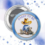 Daddy to Be of a Lil' Cowboy | Baby Shower Button<br><div class="desc">Oh,  boy,  it's a Lil' Cowboy! Blue and brown baby Dad to be buttons featuring a little baby boy in a cowboy hat sitting with a teddy bear,  train and baby chick. Country and western themed rustic boy's baby shower.</div>