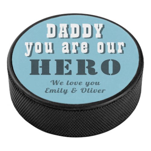Daddy you are our Hero Blue Father`s Day Hockey Puck - Daddy you are our Hero Blue Father`s Day Hockey Puck. You can change daddy into dad, papa, pap,... and add your photo and names. A cute gift and a sweet keepsake for Father`s Day for dad.