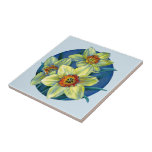 Daffodil yellow blue fine art painting tile<br><div class="desc">Beautiful fine art floral painting of spring daffodils / Narcissus in yellow, orange red, green and blue hues. Tile background color can be changed to your own color choice if required currently light blue. Printed for a original watercolor and gouache floral painting on dark paper by Sarah Trett www.sarahtrett.com for...</div>