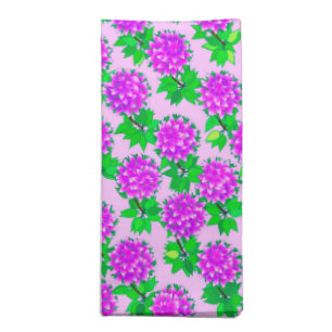 Dahlia flowers in violet and orchid cloth napkin