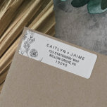 Dainty Elegance Wedding Label<br><div class="desc">These dainty elegance wedding return address labels are perfect for a minimalist wedding. The floral design features a simple and elegant arrangement of delicate black and white wildflowers. Purchase the return address label size for your wedding invitations, and the address label size for your RSVP envelopes. These labels can be...</div>