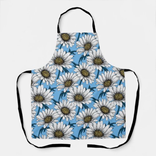 Daisies wild flowers on blue apron