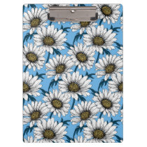 Daisies, wild flowers on blue clipboard
