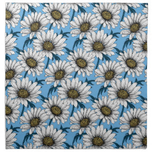 Daisies, wild flowers on blue cloth napkin