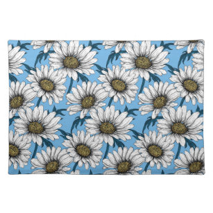 Daisies, wild flowers on blue cloth placemat