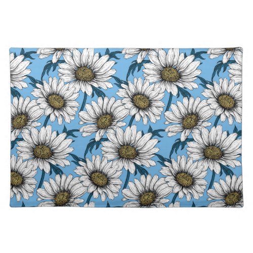 Daisies wild flowers on blue cloth placemat