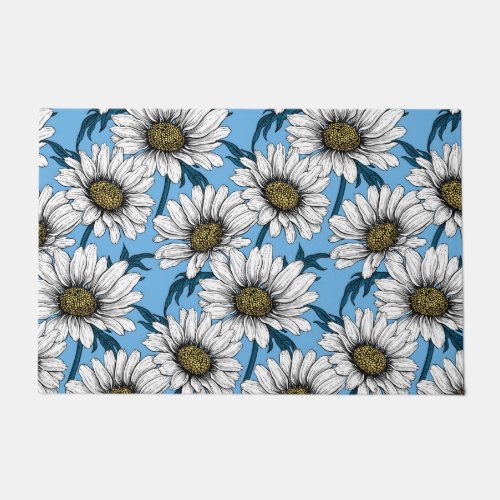 Daisies wild flowers on blue doormat