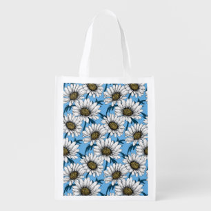 Daisies, wild flowers on blue grocery bag