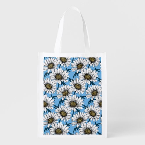 Daisies wild flowers on blue grocery bag