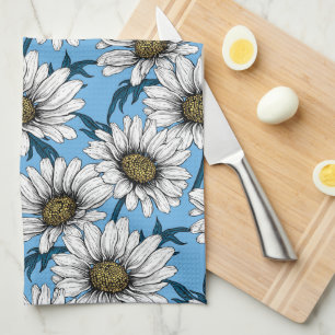 Daisies, wild flowers on blue kitchen towel