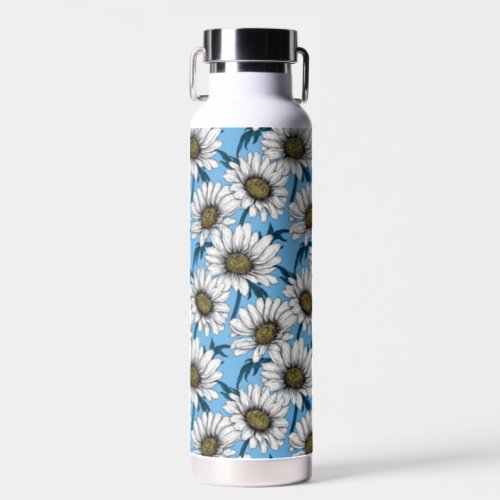 Daisies wild flowers on blue water bottle