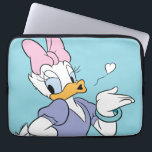 Daisy Duck Blowing a Kiss Laptop Sleeve<br><div class="desc">Spread a little love with this timeless and charming Daisy Duck character graphic! Captured in a classic, flirtatious pose blowing a delicate heart-shaped kiss, this design radiates sweetness and personality. With her iconic pink bow, purple blouse, and matching heels, this illustration is a beautiful celebration of classic animation style. The...</div>