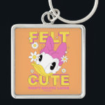 Daisy Duck "Felt Cute" Retro Floral Graphic Keychain<br><div class="desc">Embrace your inner icon with this playful and trendy statement design! This graphic puts a modern, social-media-inspired twist on classic Daisy character art, featuring the popular "Felt Cute" caption alongside a charming, wide-eyed character portrait. The design is bursting with a "Y2K-meets-springtime" vibe, featuring bold sunshine yellow block lettering, sweet white...</div>