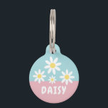 DAISY PET ID TAG<br><div class="desc">Let your pet's personality bloom with our 'Daisy' Pet ID Tag, capturing the essence of spring with its fresh and airy design. This tag showcases lovely daisies set against a tranquil blue sky, with a sweet pink touch where your pet's name shon in the sample as, 'DAISY', is charmingly displayed....</div>