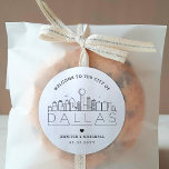 Dallas Skyline | Wedding Welcome Favor Classic Round Sticker<br><div class="desc">Enhance your wedding welcome packages or event party favors with a custom set of welcome stickers! These elegant yet minimal-style stickers are tailored for a wedding taking place in the beautiful city of Dallas, Texas. They feature a modern deco skyline with the name of the city integrated underneath. All elements...</div>