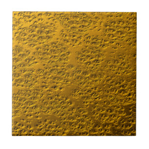 Damaged gold ceramic tile