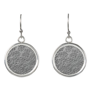 Damaged silver metal earrings