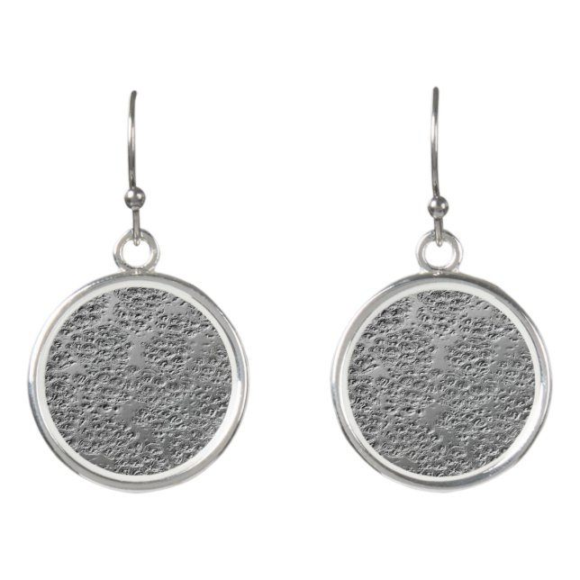 Damaged silver metal earrings (Front)