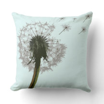 Dandelion blowing, seeds scattering pillows