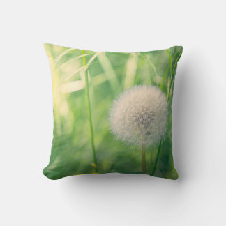 Dandelion in greenery with soft summer light throw pillow