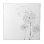 Dandelion Seeds Blowing Ceramic Tile<br><div class="desc">Dandelion seeds blow in the wind.</div>