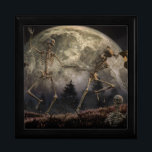 Danse Macabre Gift Box<br><div class="desc">Three skeletons dance in the moonlight while a forth plays the lute. Meanwhile, another skeleton emerges from the ground to join the party.</div>