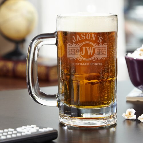 Dapper Marquee 14 oz. Benton Glass Beer Mug - Sit down with your best buddies and cold beer held by our incredibly dapper Marquee custom beer mugs. Engraved with our vintage inspired Marquee graphic, this beer glass is made just for you and features the name, set of initials, year, and phrase of your choice. A unique keepsake for any special occasion, our Benton beer mugs are crafted from durable and thick premium glass and feature a thick base to discourage condensation. These mugs measure  6" x 5" x 3.25" and hold 14 oz of beer. These personalized beer glasses are also dishwasher safe.