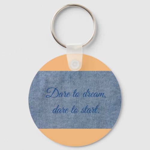 dare in your life slogan on jeans Keychain 