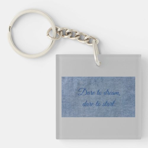 dare in your life slogan on jeans Keychain
