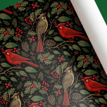 Dark and Moody Christmas Cardinals Wrapping Paper<br><div class="desc">Celebrate the holidays with this classy and moody Christmas design. This Christmas holiday wrapping paper features dark and moody colors with cardinal birds,  foliage,  and holly berries against a black background. Change the background colors and personalize it for your needs.</div>