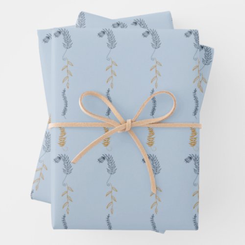 Dark blue and golden floral doodles in blue wrapping paper sheets