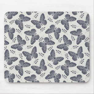 Dark blue butterfly pattern on grey background mouse pad