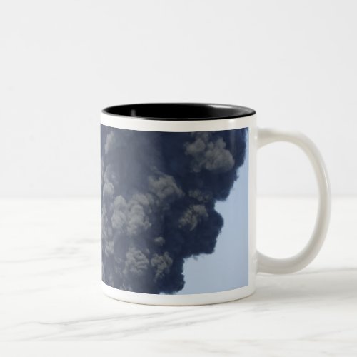 Dark clouds of smoke and fire emerge 2 Two_Tone coffee mug