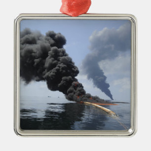 Dark clouds of smoke and fire emerge 3 metal ornament