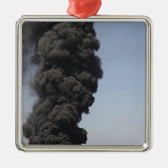 Dark clouds of smoke and fire emerge metal ornament (Front)