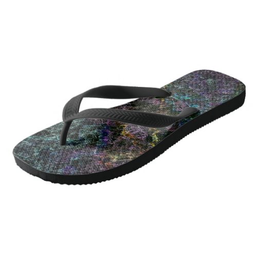 Dark colored texture destroyed or corroded sponge flip flops