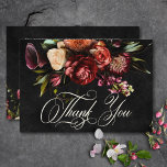 Dark Elegant Autumn Floral Wedding Thank You Card<br><div class="desc">Step into a realm of exquisite elegance with our floral dark and moody wedding thank you card. Designed to captivate the senses, this design boasts a striking black background adorned with a breathtaking burst of autumnal florals in deep burgundy, burnt orange, creamy hues, and touches of luxurious gold, complemented by...</div>