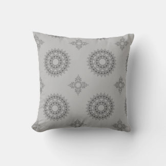 dark gray, intricate mandala-like designs against throw pillow