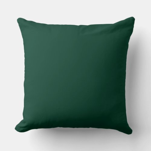 Dark green throw pillow
