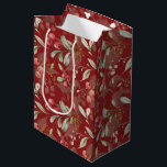 Dark Red Elegant Greenery Botanical Christmas  Medium Gift Bag<br><div class="desc">Designed in timeless Christmas colors of rich reds, vibrant greens, and elegant ivory, this bag exudes holiday charm. The custom dark red background adds a touch of sophistication, making your gift truly stand out. This versatile gift bag is the perfect finishing touch to any present, regardless of your style preferences....</div>