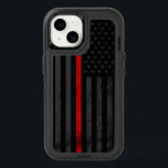 Dark & Rugged Style | Fire Fighter Flag OtterBox iPhone 14 Case<br><div class="desc">An iPhone OtterBox case featuring a dark and distressed style Firefighter flag with a vibrant red line running through the center of it. In the background is a faded dark American flag which is subtle enough to fly under the radar, but vivid enough to be a clear show of patriotism....</div>