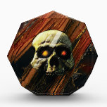 Dark Skull Award<br><div class="desc">Evil skull with glowing eye sockets and a dark background spattered with streaks of orange,  maroon,  and black. Happy Halloween,  mortals.</div>