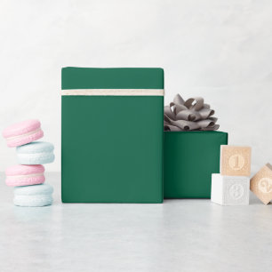 dark teal-green folder mockup above a matching wrapping paper