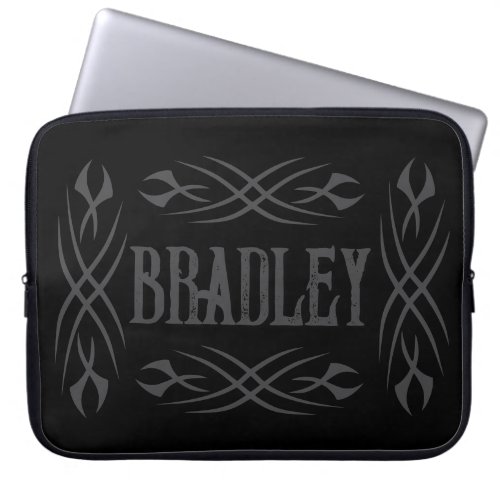 Dark tribal tattoo design on personalized laptop sleeve