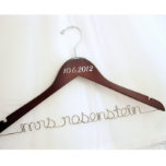 Dark Walnut Wood Personalized Wedding Dress Hanger<br><div class="desc">This personalized bridal hanger showcases your future name and wedding date on a beautifully finished dark walnut wood,  and is the perfect shower,  bachelorette party,  or bridesmaid gift! No bride should be left with a boring plastic hanger for their wedding dress photos!</div>